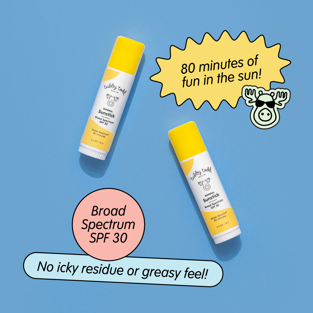 Two bottles of sunscreen stick with text on a blue background